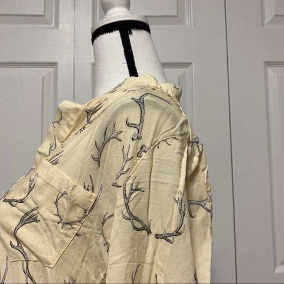 unique antlers on an ivory colored button down top - Picture 5 of 10